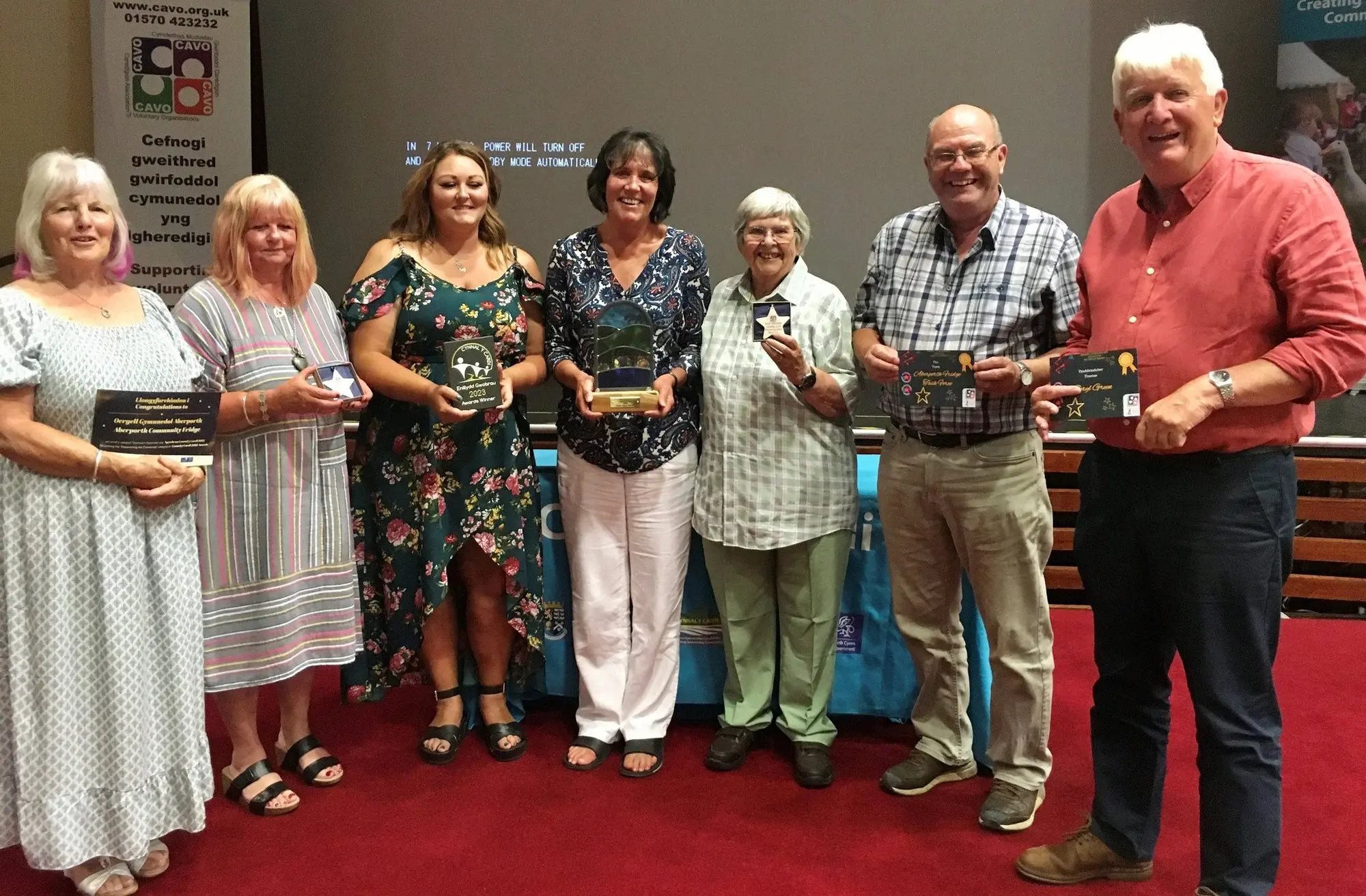 Volunteers receiving community awards
