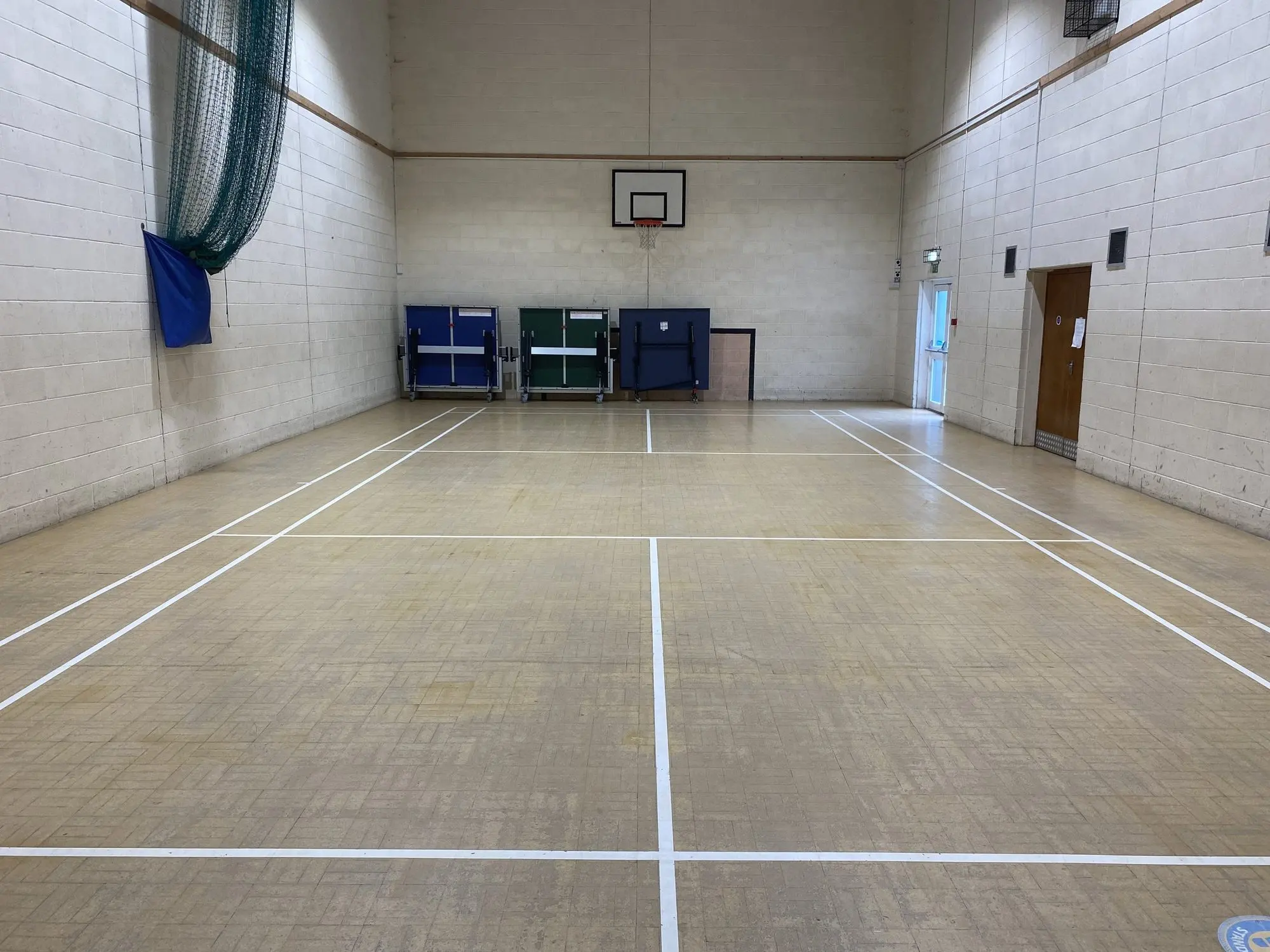 The sports hall at Canolfan Dyffryn with court markings